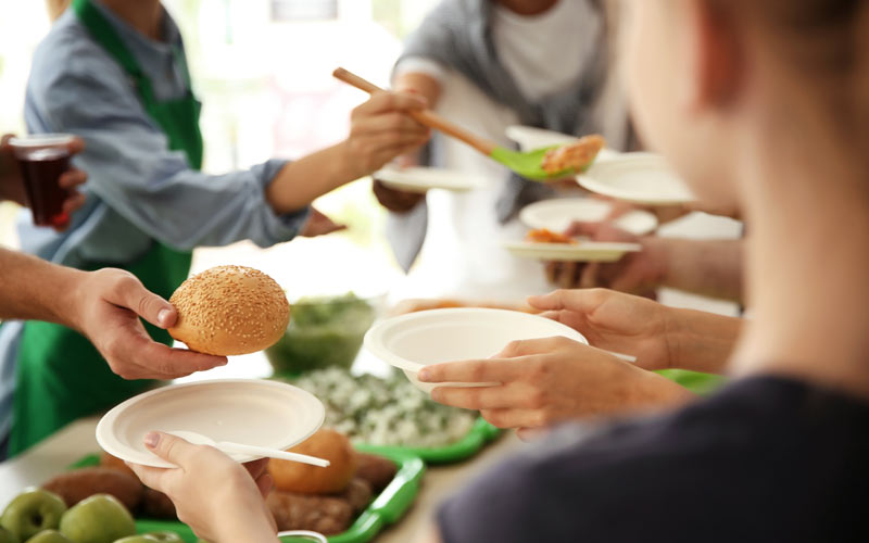 giving food | saluting volunteers