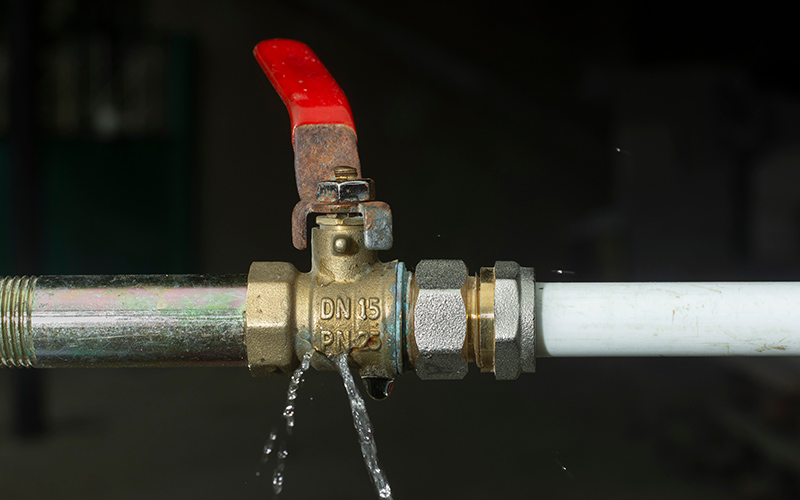 damaged pipe with leak