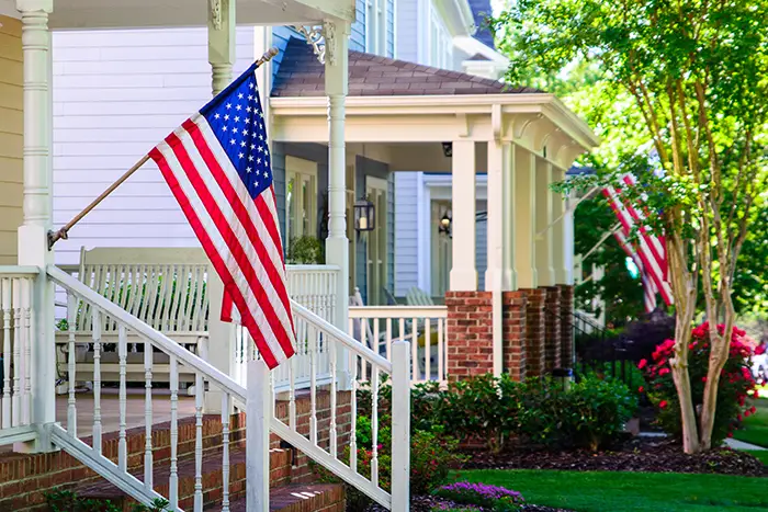 usa flag in front of house | fourth of July